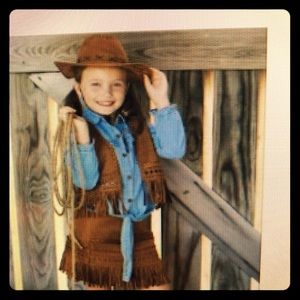 Child’s vest and skirt. Brand new. Never worn